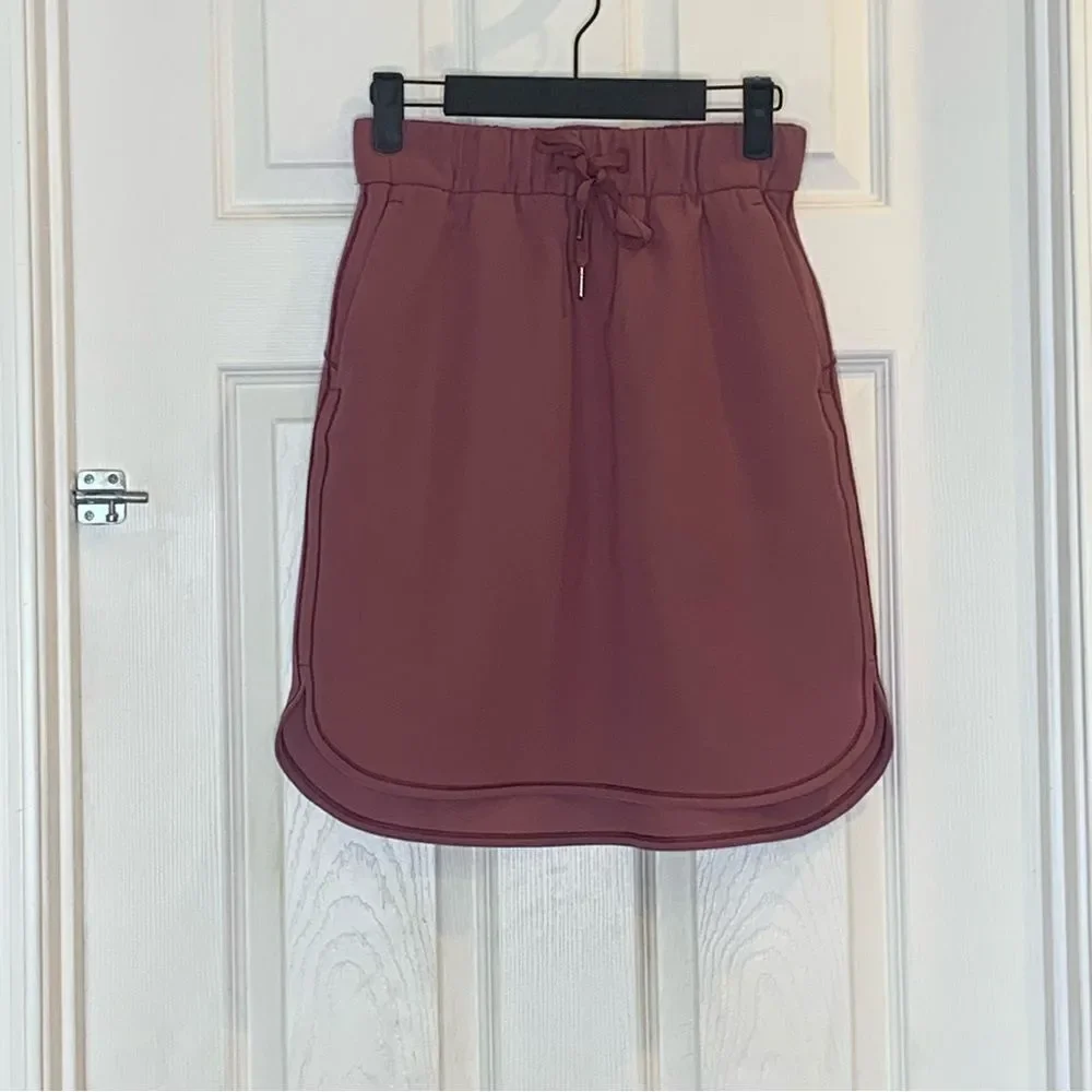 Lululemon on the fly skirt, color: cherry cola, size 4